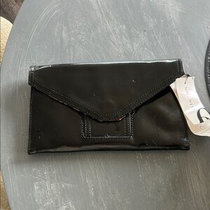 Nine West reversible  Glossy Black Clutch